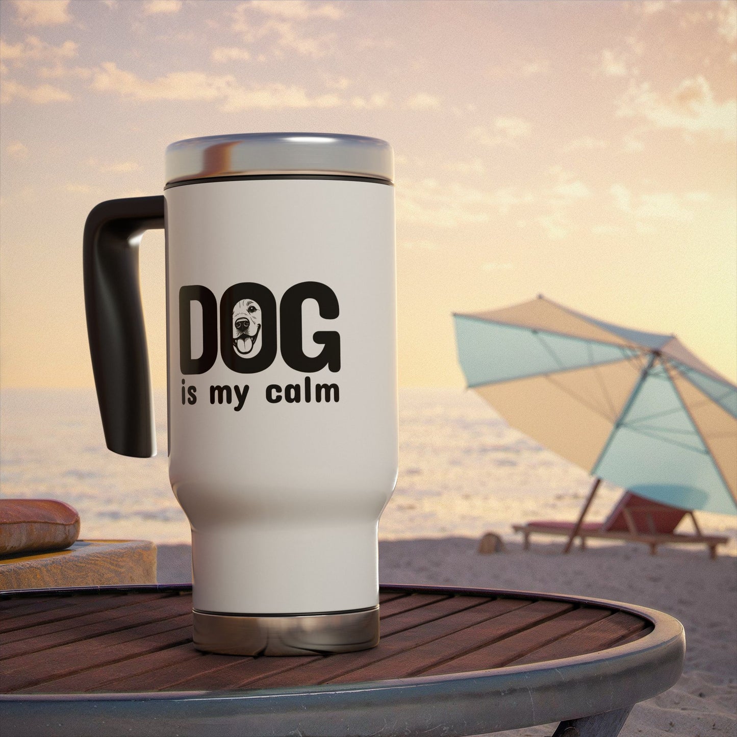 White travel mug with 'DOG is my calm' text on a beach setting