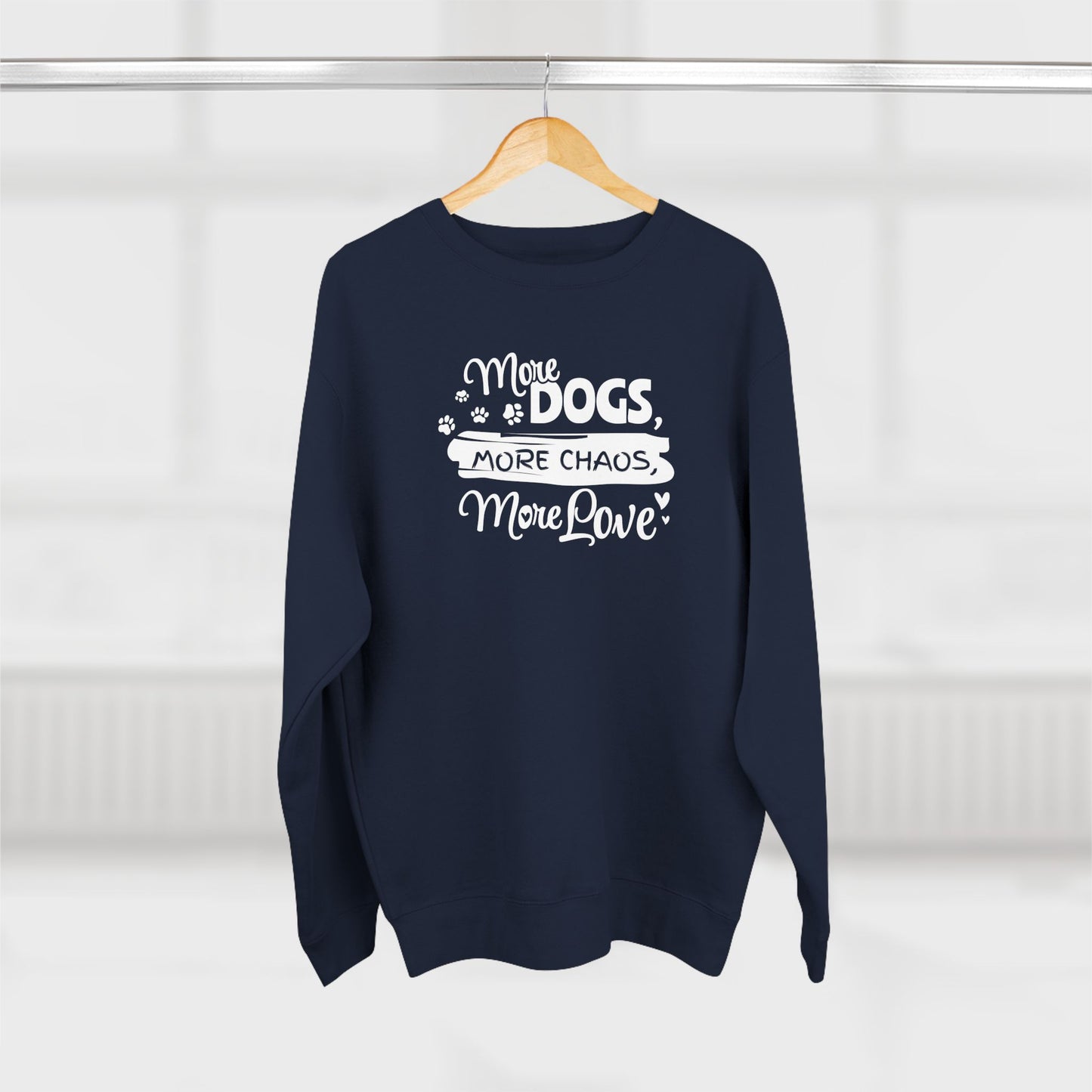 Navy blue sweatshirt with white text on a wooden hanger against a white background