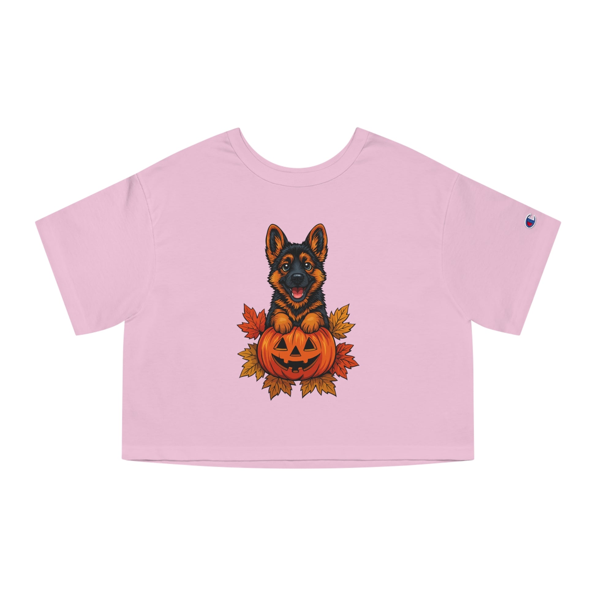 Pink crop top with a Halloween-themed graphic of a dog and pumpkin on a white background