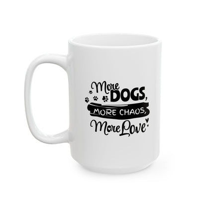 White mug with black text 'More Dogs, More Chaos, More Love' on a white background
