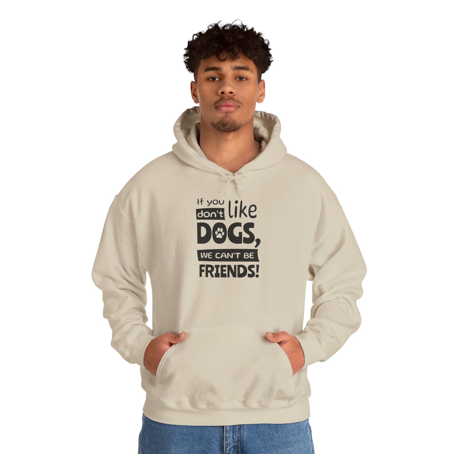 Person wearing a beige hoodie with text 'If you don't like dogs, we can't be friends!' on a white background