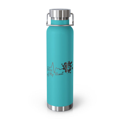 Turquoise water bottle with a design and text on a white background