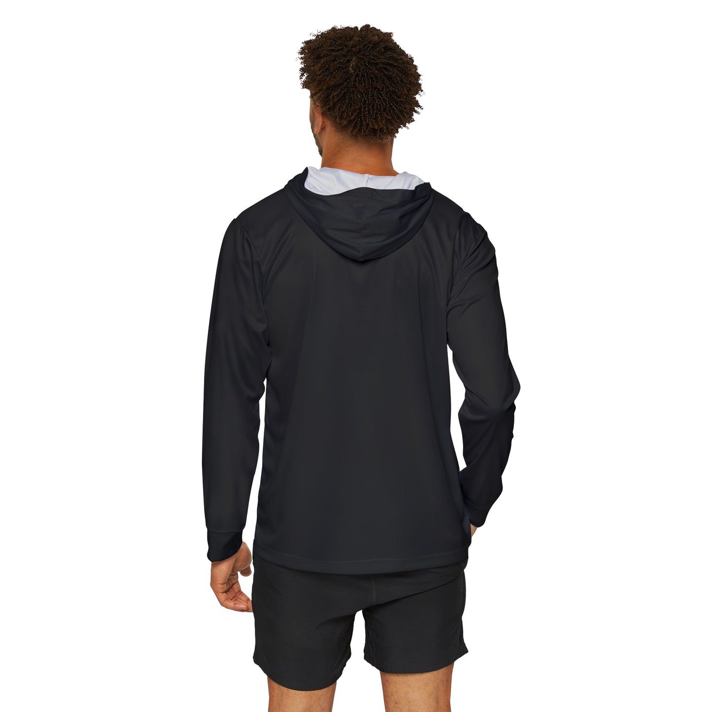 Person wearing a black hoodie and shorts on a white background