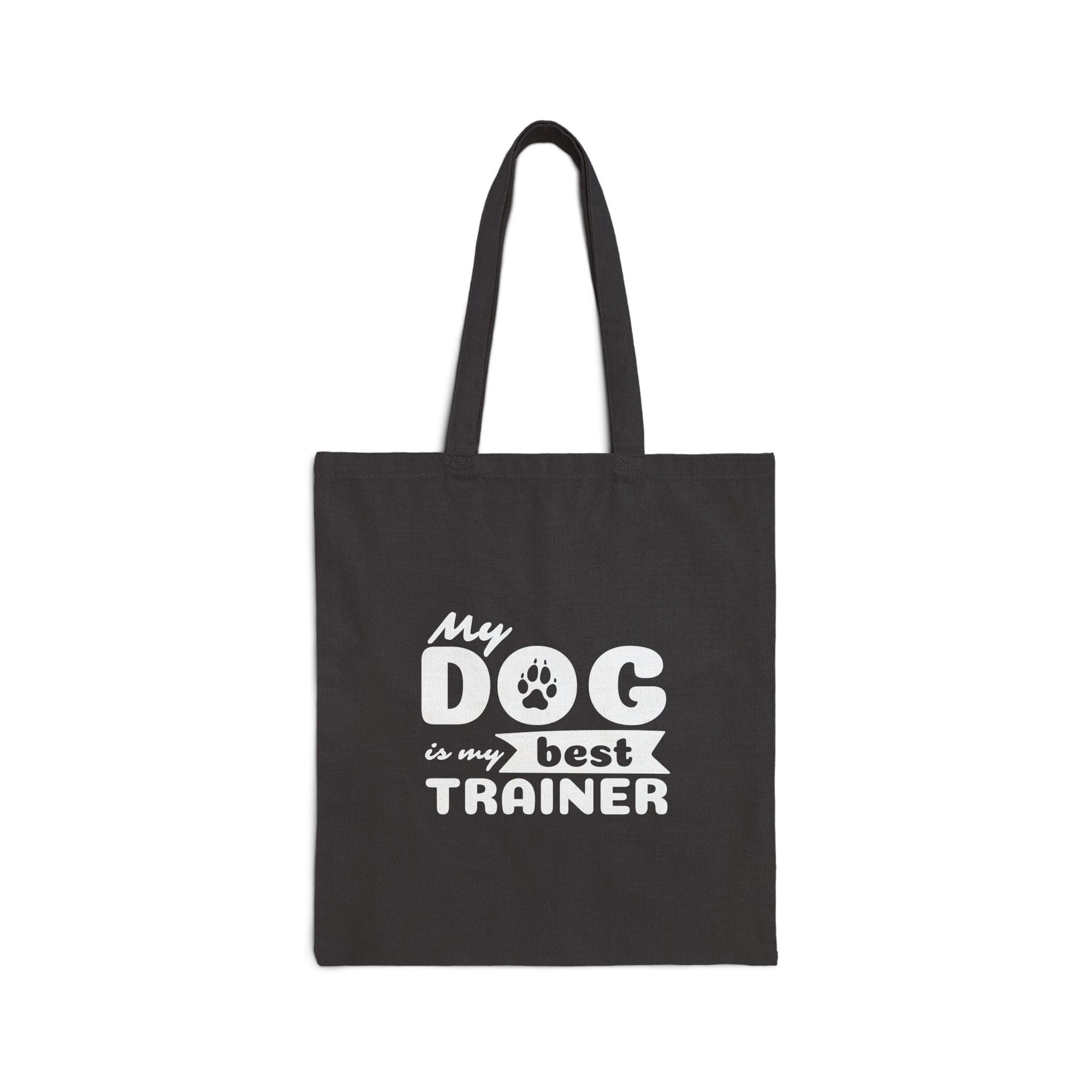Black tote bag with 'My dog is my best trainer' text on a white background