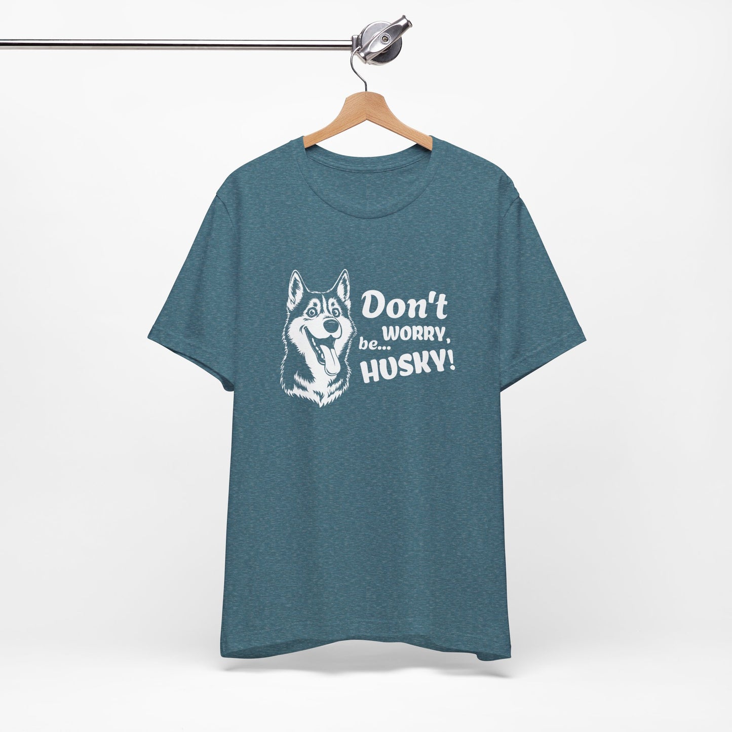 Blue t-shirt with husky graphic and text on a hanger against a white background