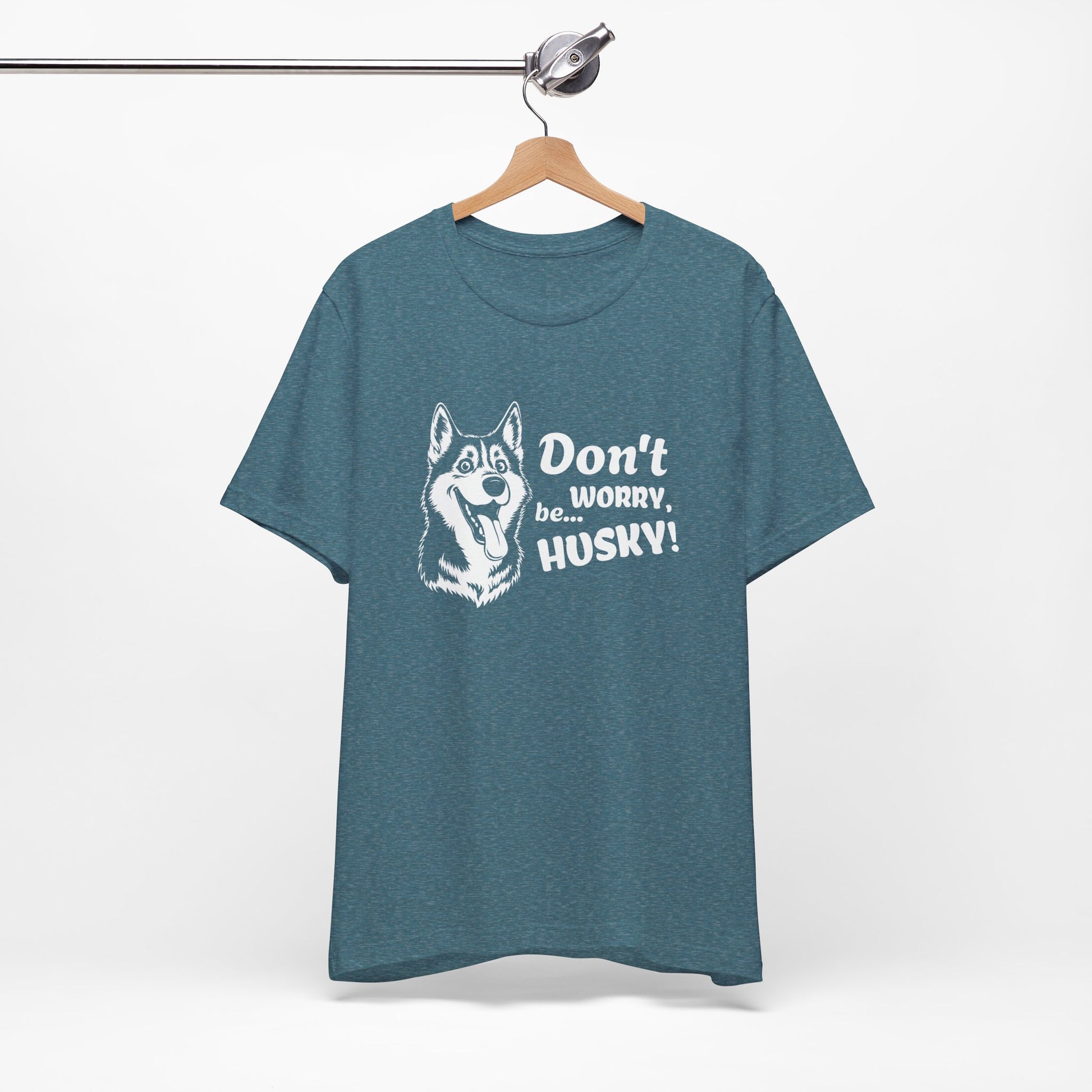 Blue t-shirt with husky graphic and text on a hanger against a white background