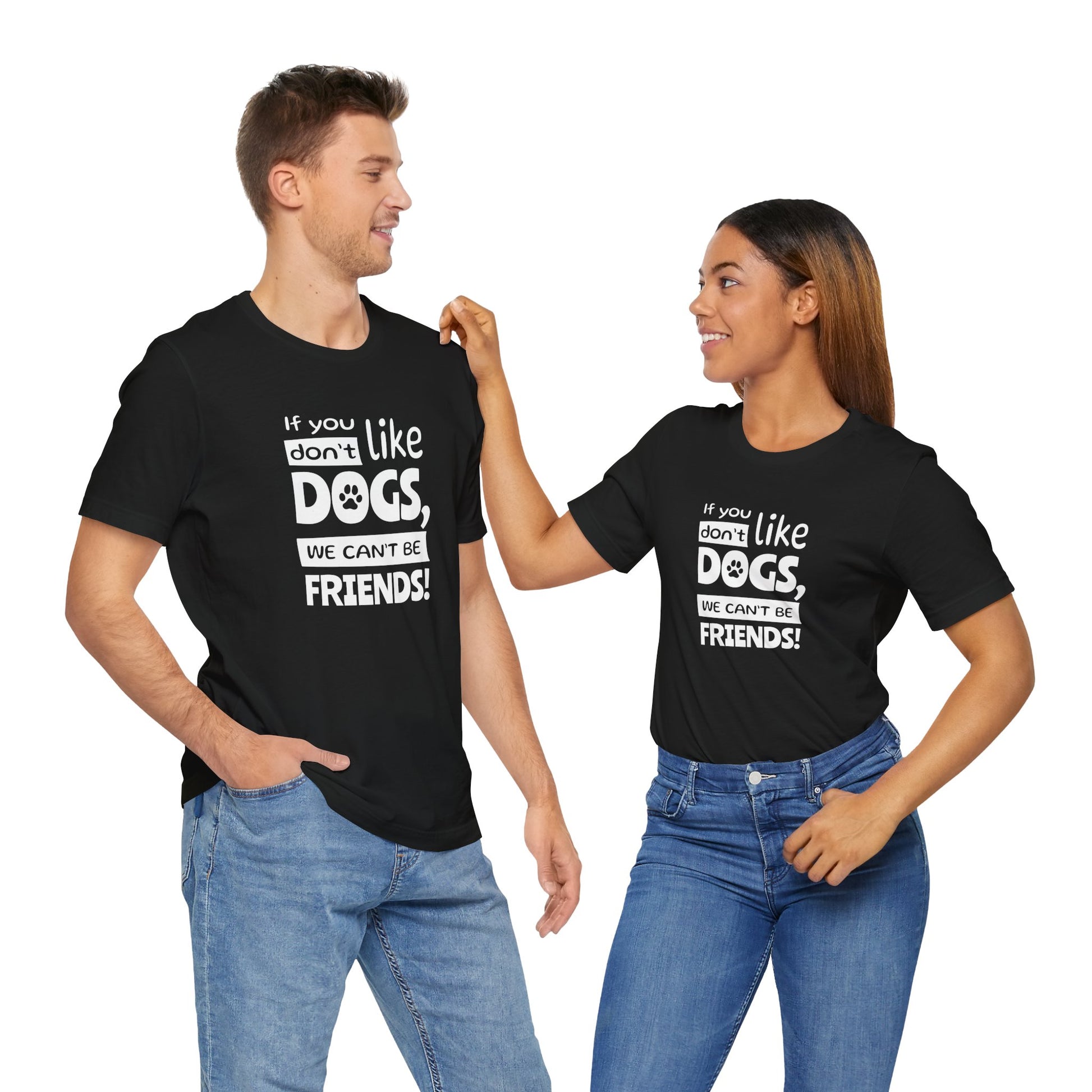 Two people wearing black t-shirts with humorous dog-themed text on a white background