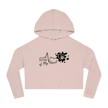 Pink cropped hoodie with 'Rhythm of My Heart' design on a white background