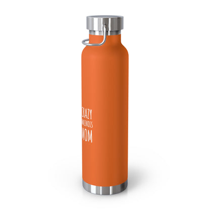 Orange water bottle with silver cap on a white background