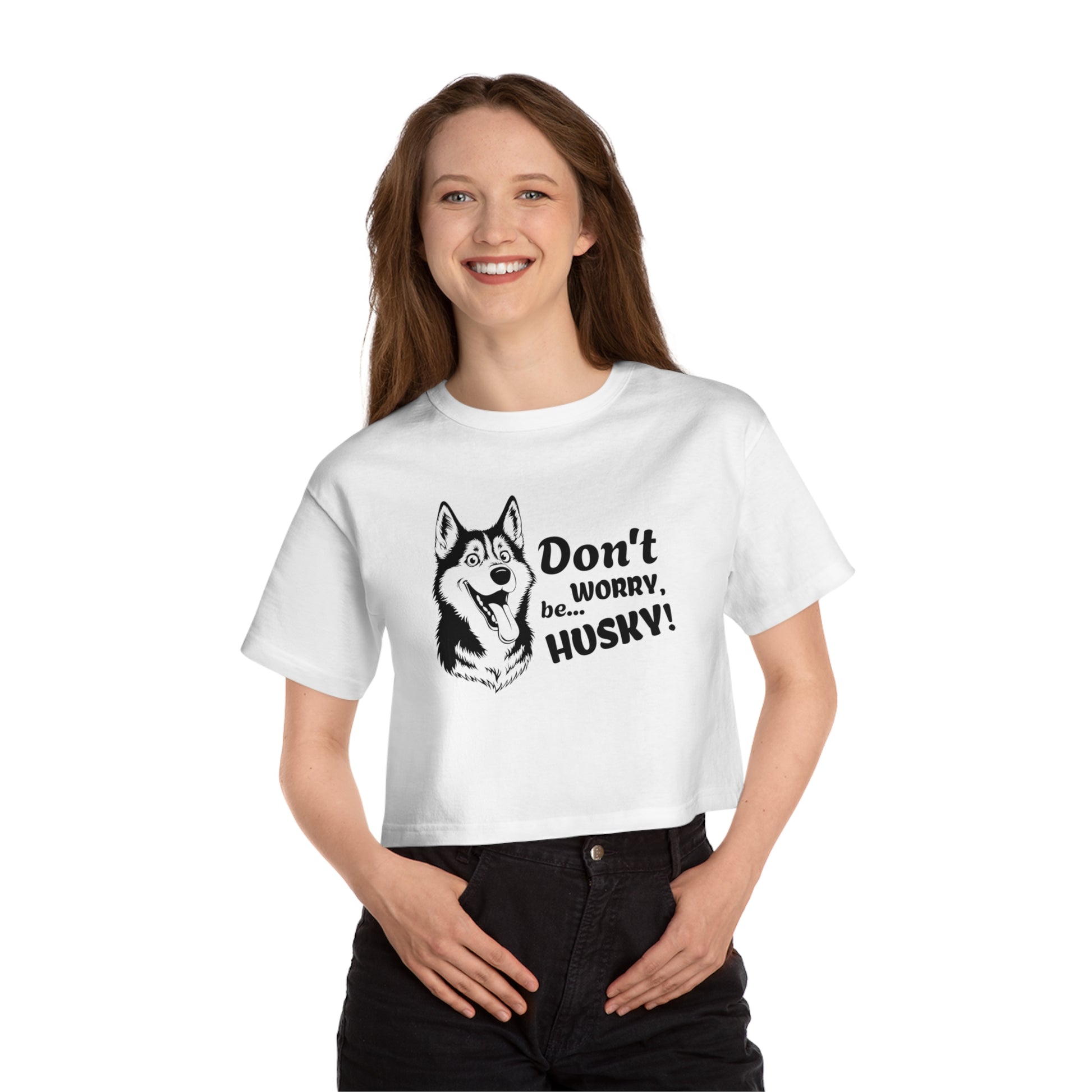 Person wearing a white t-shirt with a husky graphic and text on a white background