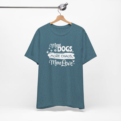 Blue t-shirt with white text 'More Dogs, More Chaos, More Love' on a hanger against a white background