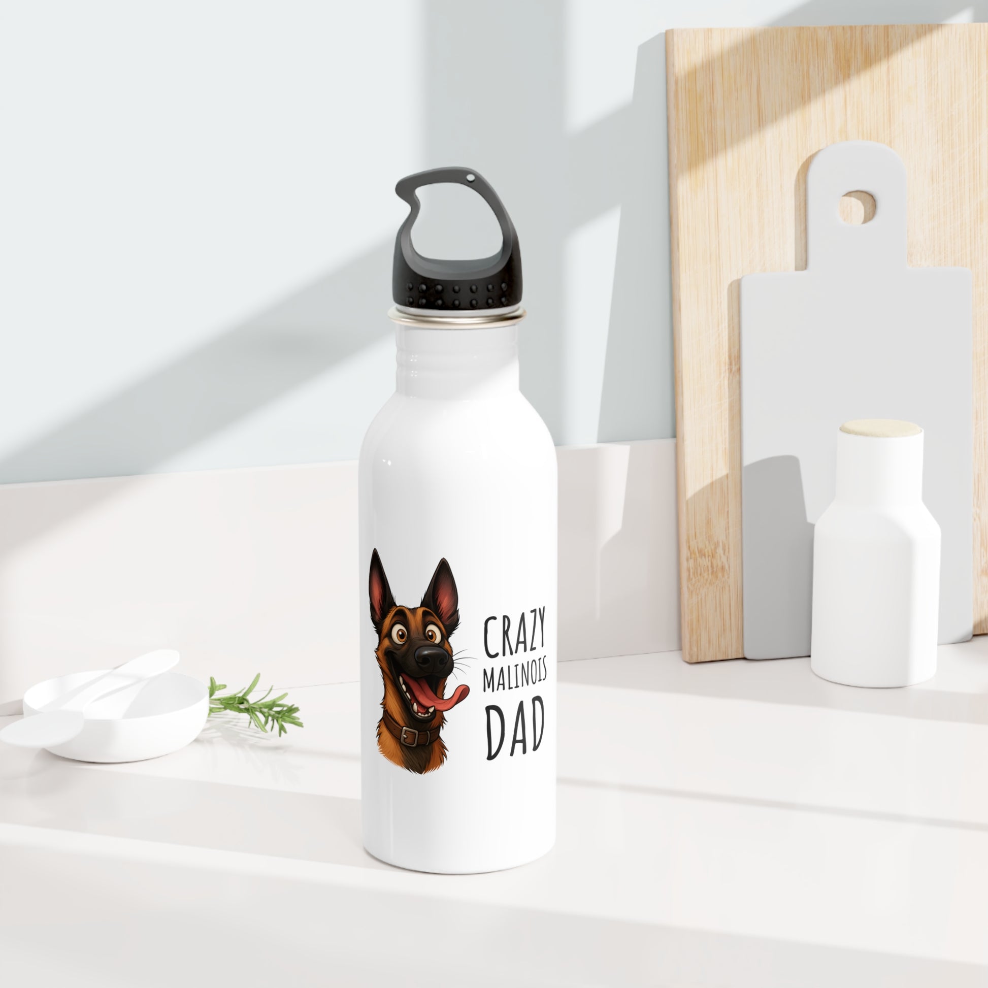 White water bottle with a dog illustration and text on a white surface.