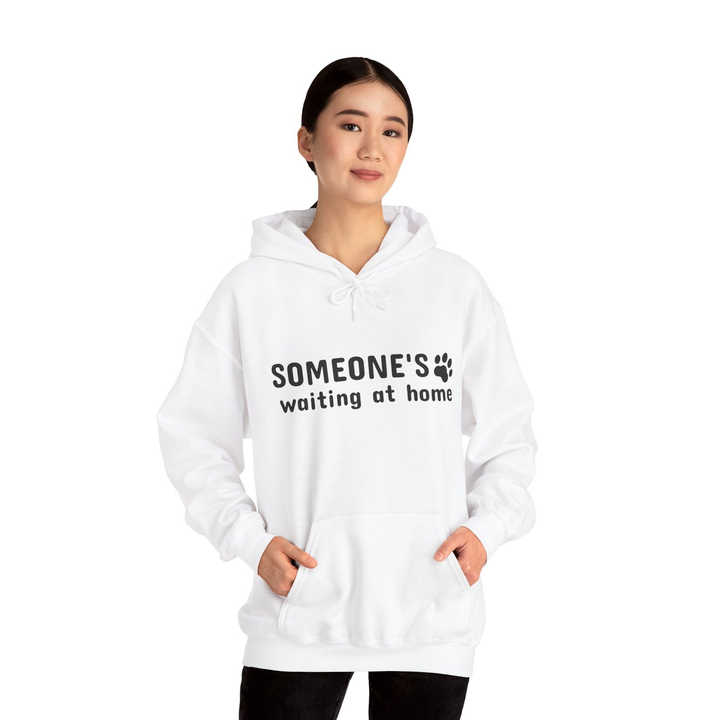 Person wearing a white hoodie with text on a white background