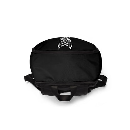 Black backpack with a decorative emblem on a white background