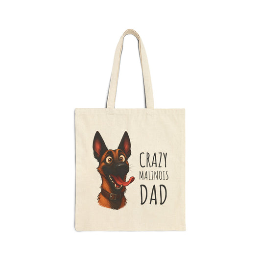 Tote bag with a dog illustration and text 'Crazy Malinois Dad' on a white background