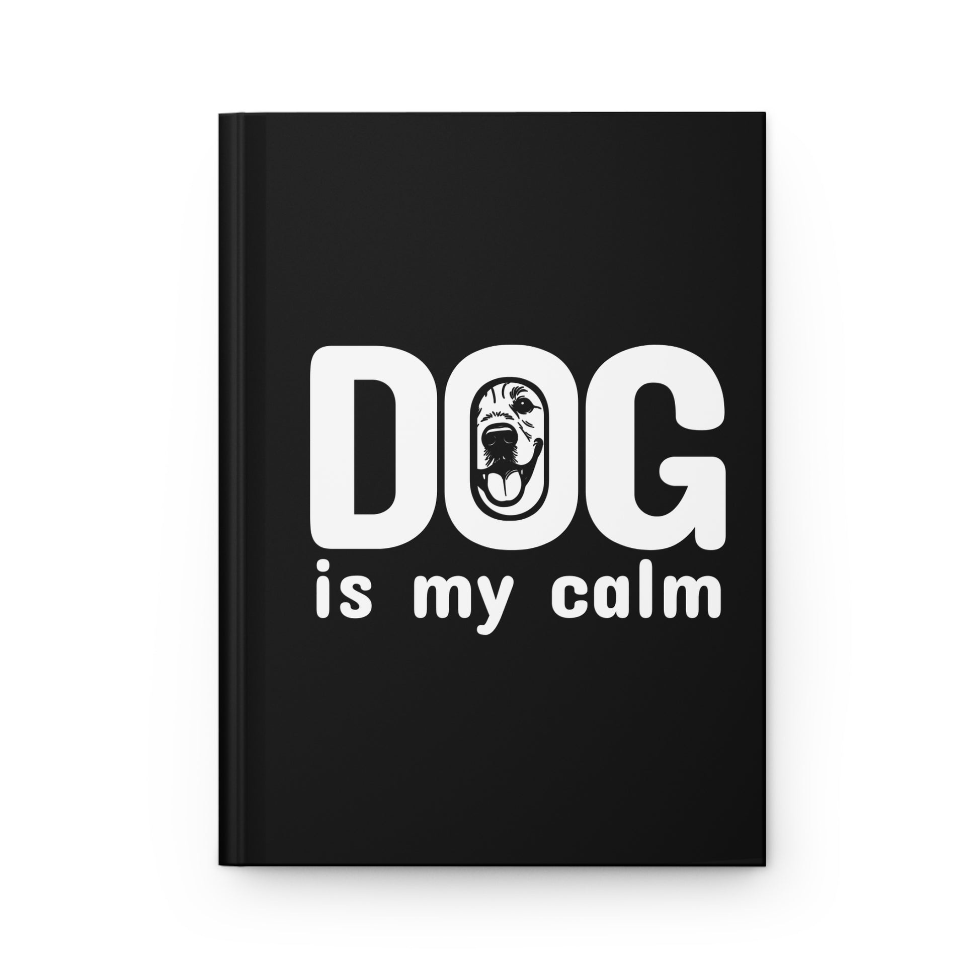 Black notebook with 'DOG is my calm' text on a white background