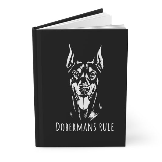 Black notebook with a Doberman illustration and 'Dobermans Rule' text on a white background
