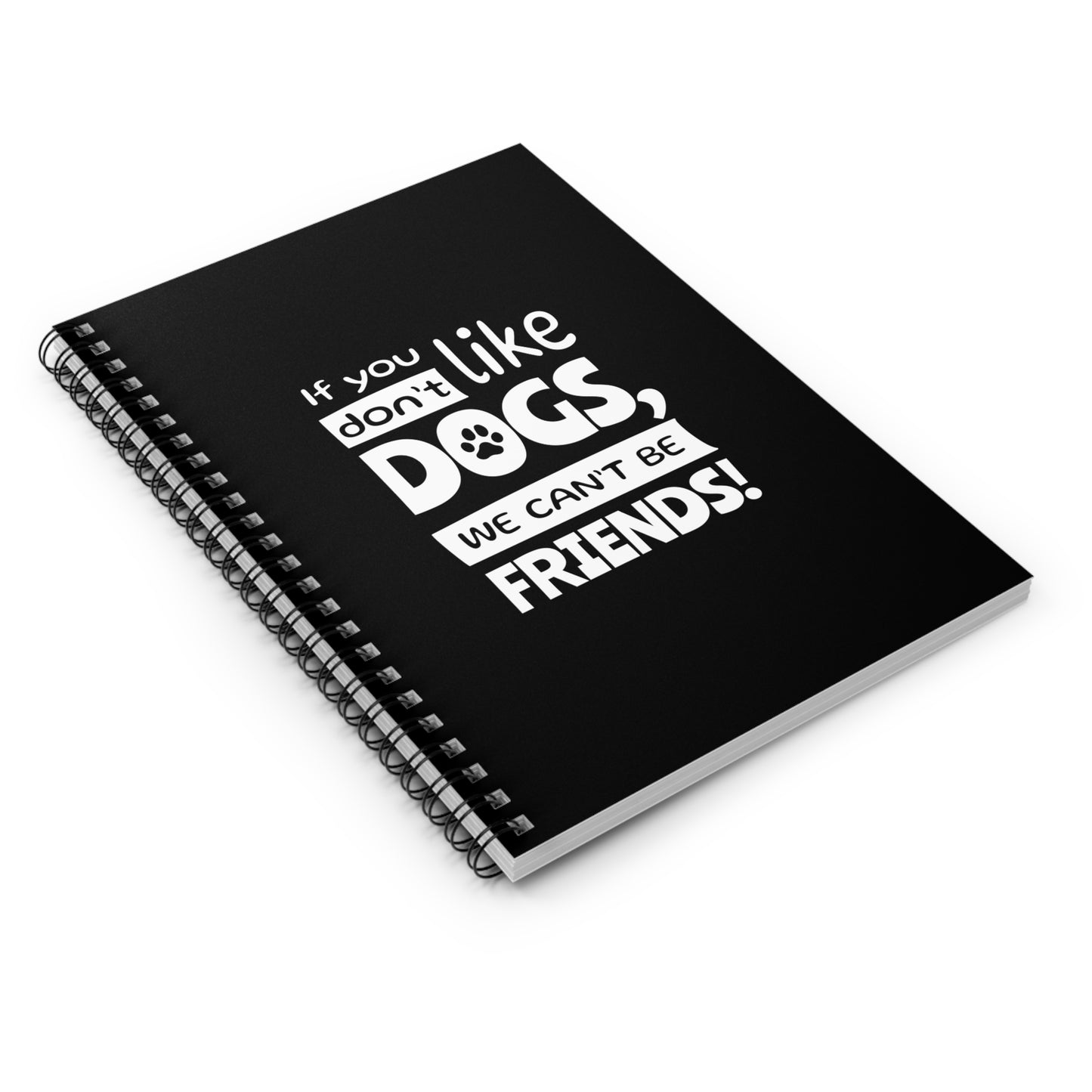 Black notebook with white text 'If you don't like dogs, we can't be friends!' on a white background