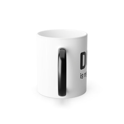White mug with black handle and text on a white background