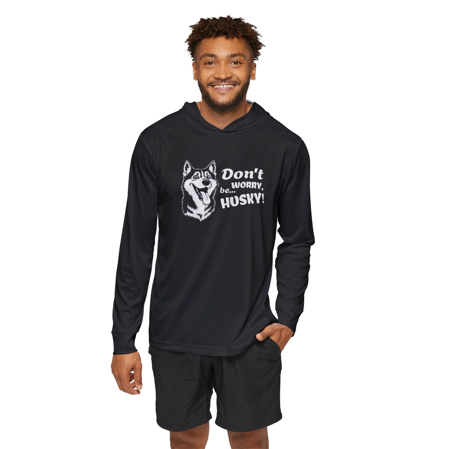 Man wearing a black hoodie with a husky graphic and text on a white background