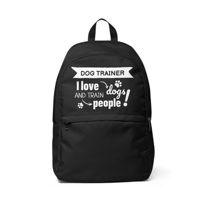 Black backpack with text 'Dog Trainer I love dogs and train people!' on a white background