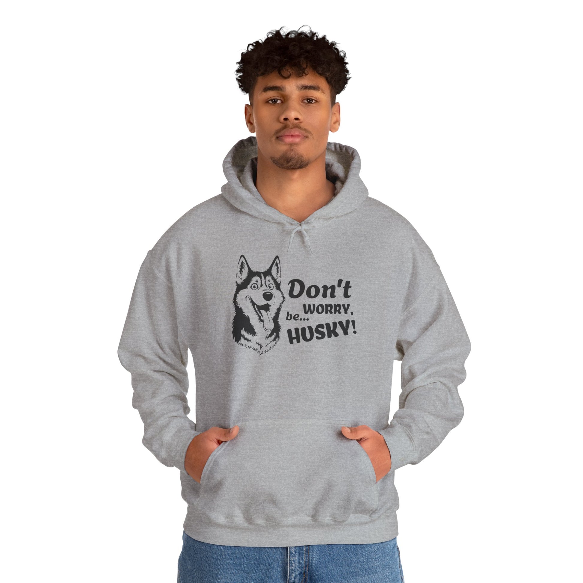 Person wearing a gray hoodie with a husky design and text on a white background