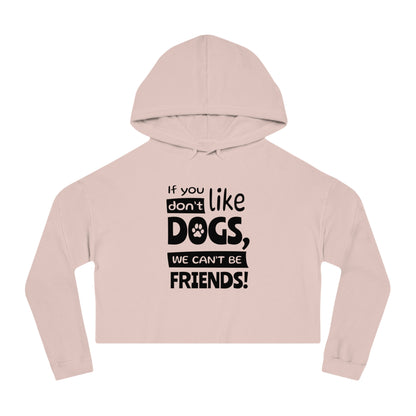 Pink cropped hoodie with text 'If you like dogs, we can't be friends!' on a white background