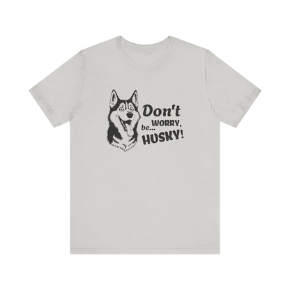 White t-shirt with husky graphic and text 'Don't worry, be HUSKY!' on a white background