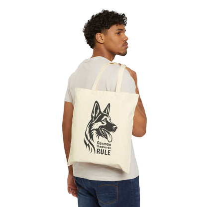 Man carrying a tote bag with a German Shepherd design and text.