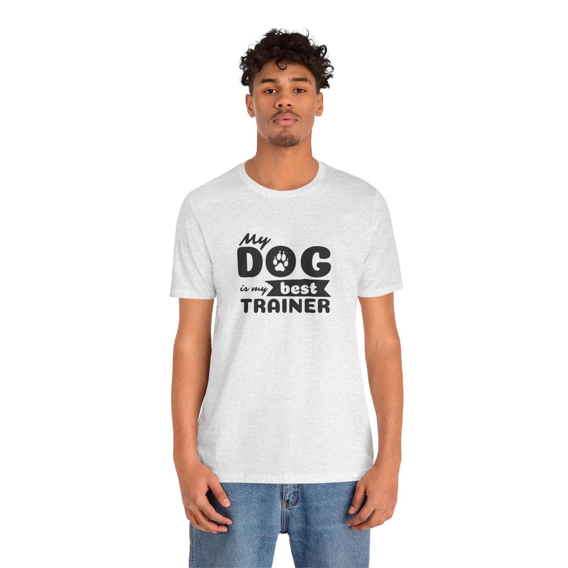 Person wearing a white t-shirt with 'My dog is my best trainer' text on a white background