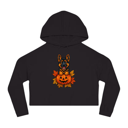 Black hoodie with a Halloween-themed design of a dog in a pumpkin on a white background