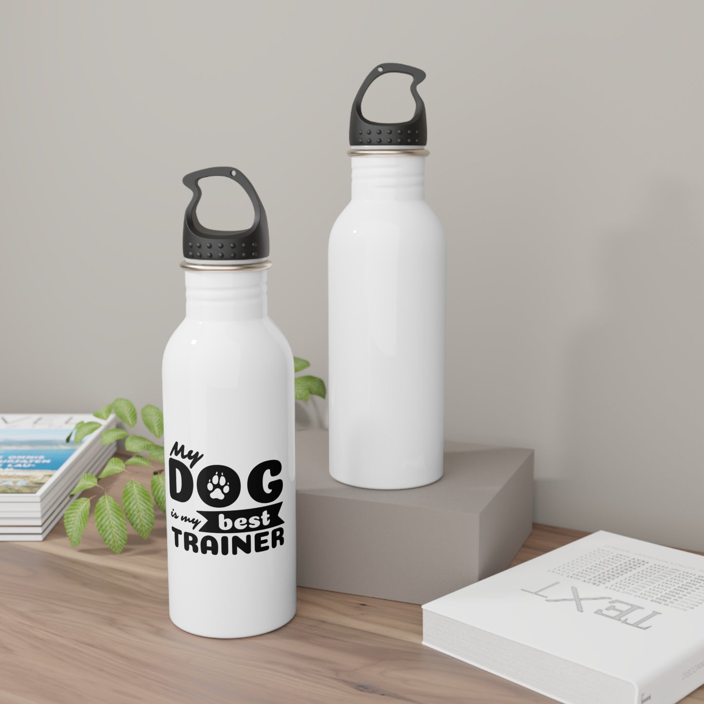 Two white water bottles with black text and accents on a wooden surface.