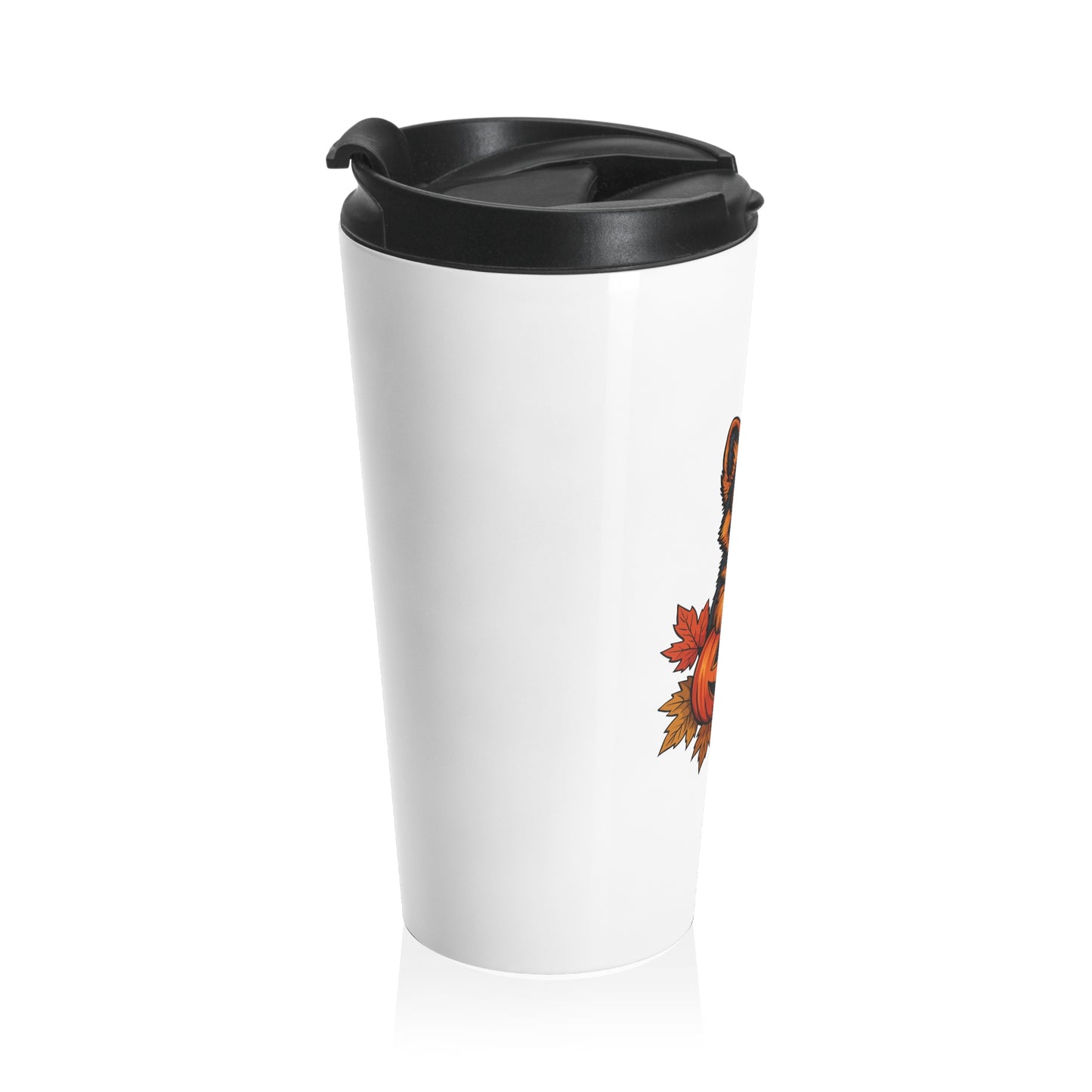 White travel mug with black lid and autumn leaf design on a white background