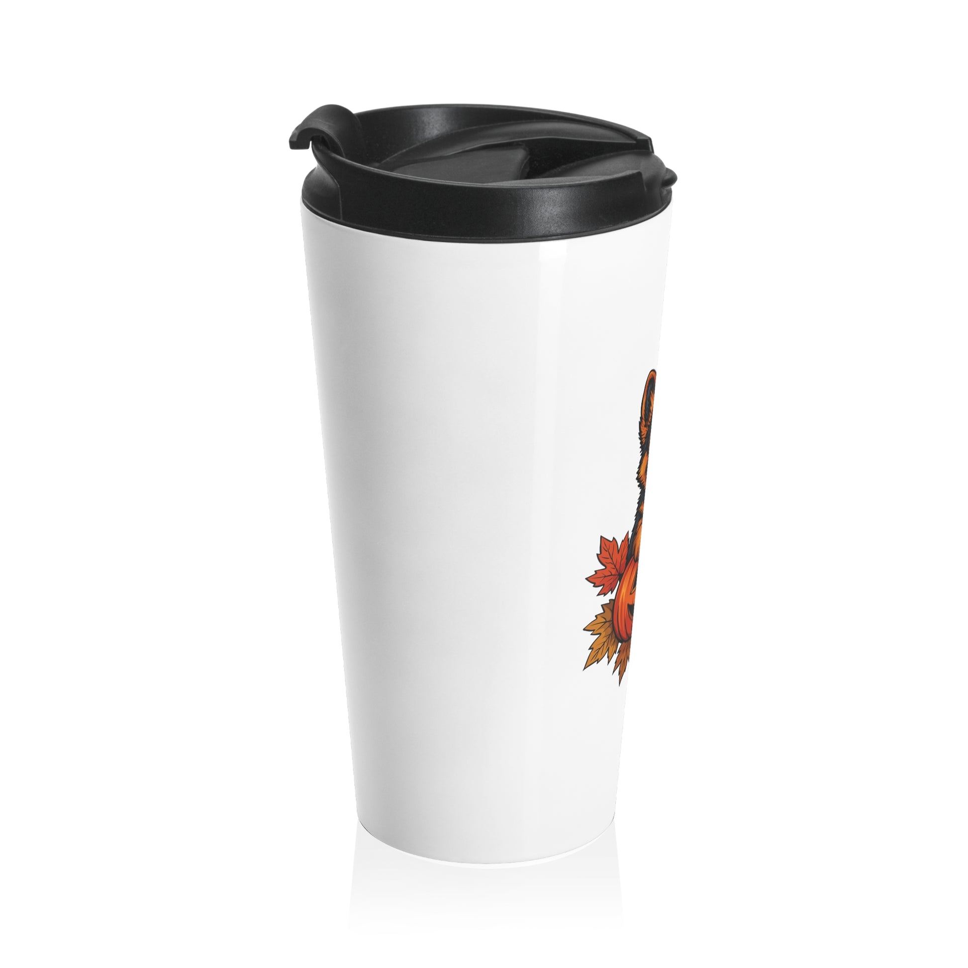 White travel mug with black lid and autumn leaf design on a white background
