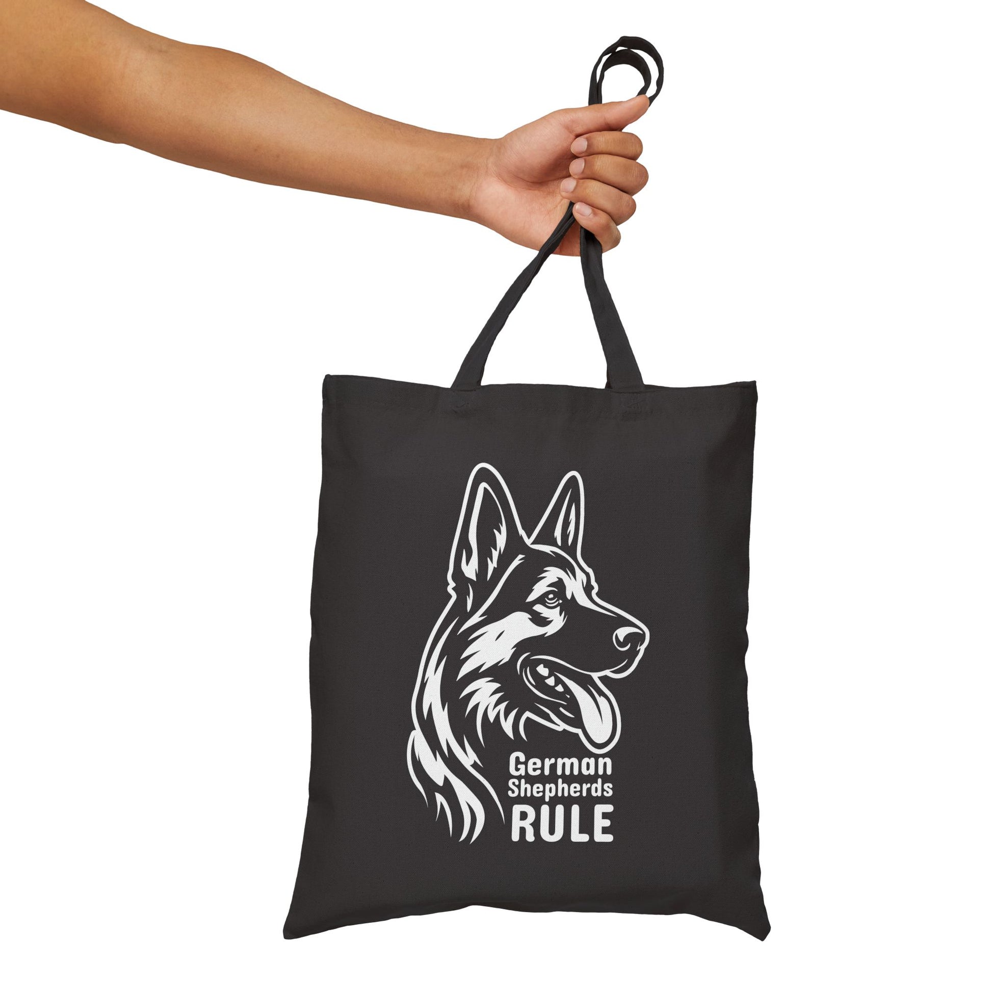 Black tote bag with a German Shepherd design and 'German Shepherds Rule' text, held by a hand.