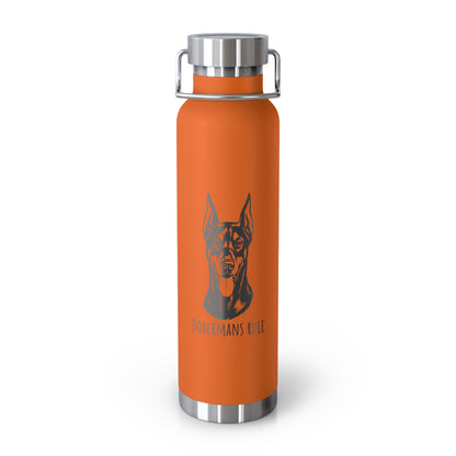Orange water bottle with a dog illustration and 'Dobermann Rule' text on a white background