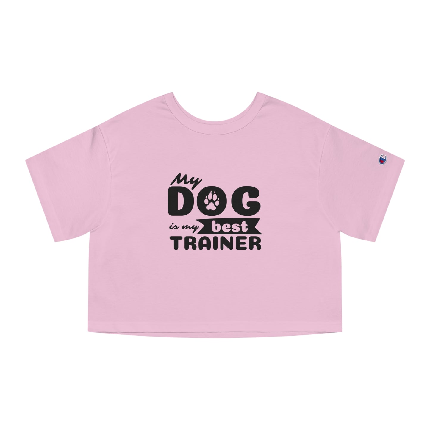 Pink crop top with 'My dog is my best trainer' text on a white background