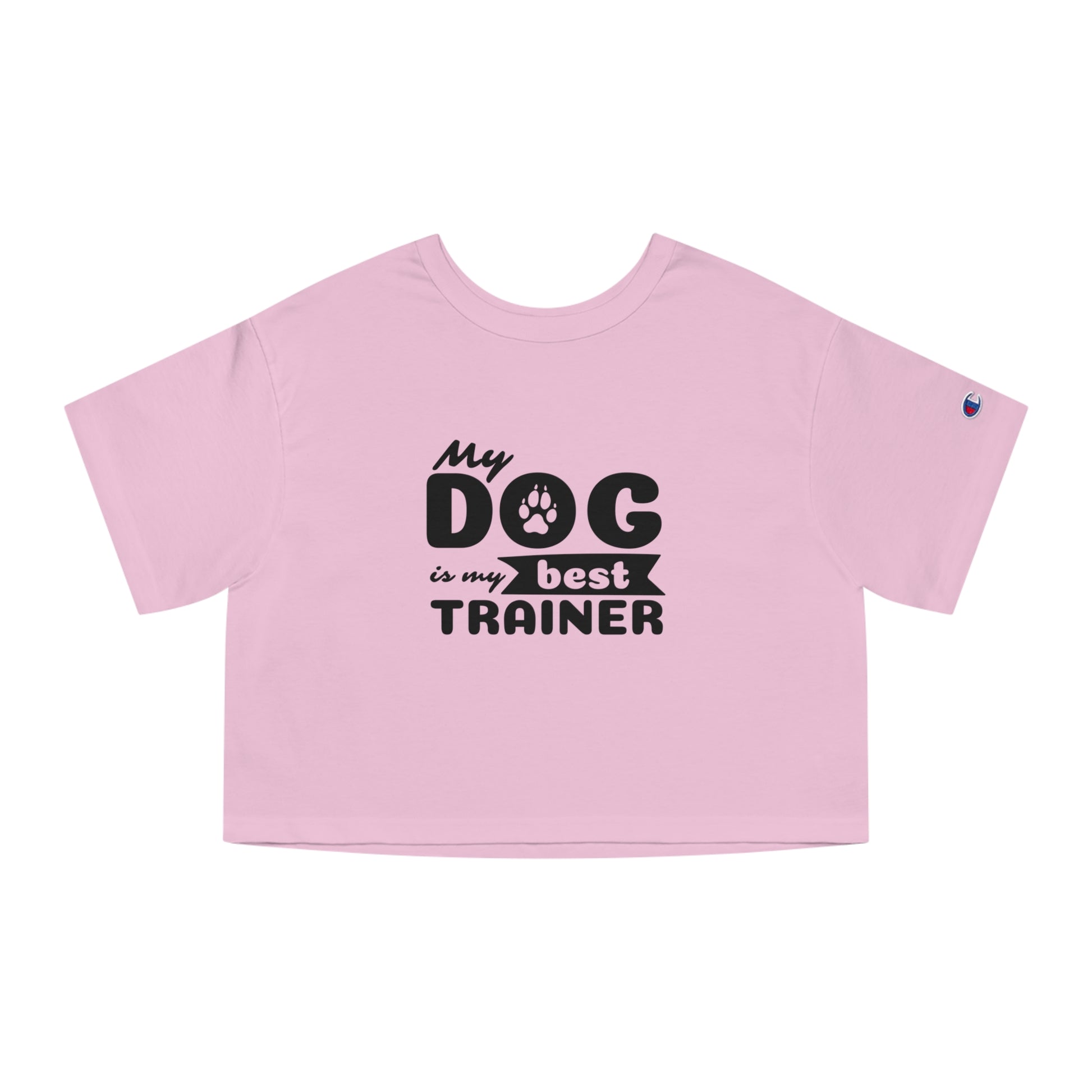 Pink crop top with 'My dog is my best trainer' text on a white background