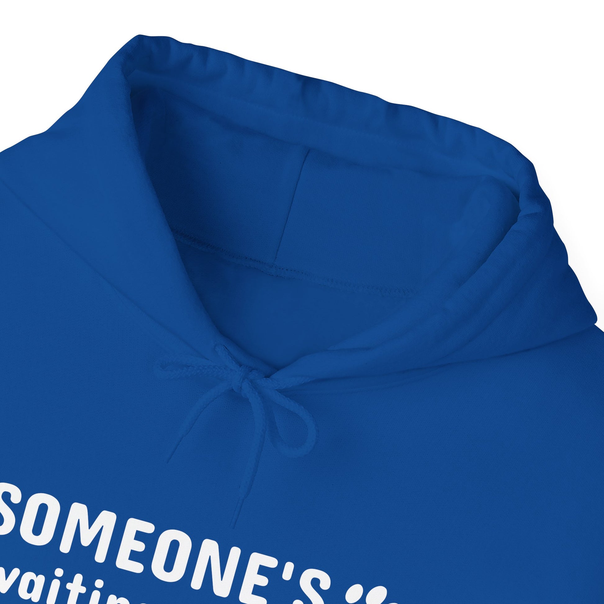Close-up of a blue hoodie with text on a white background
