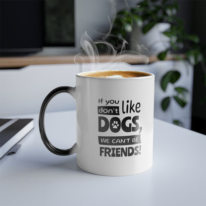 Mug with text 'If you don't like dogs, we can't be friends!' on a desk with steam rising from it.