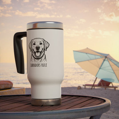White travel mug with a dog illustration and 'Labradors Rule' text on a beach setting.