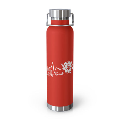 Red water bottle with a logo and text on a white background