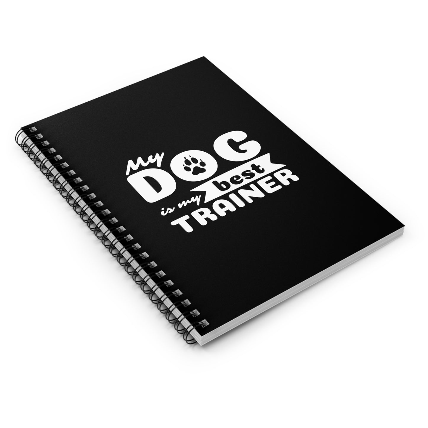 Black notebook with 'My dog is my best trainer' text on a white background