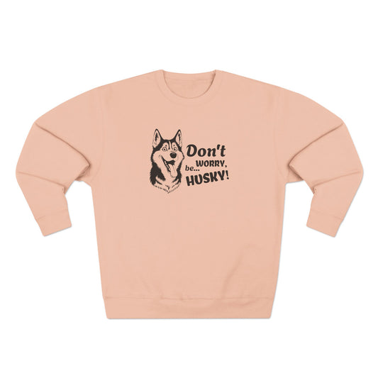 Pink sweatshirt with husky graphic and text on a white background