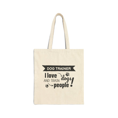 Beige tote bag with text 'Dog Trainer I love dogs and train people' on a white background