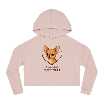 Pink cropped hoodie with a dog graphic and text on a white background