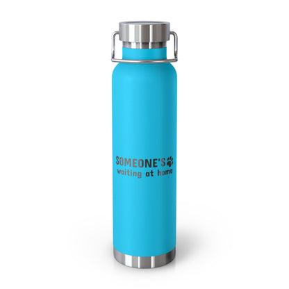 Blue water bottle with silver cap on a white background