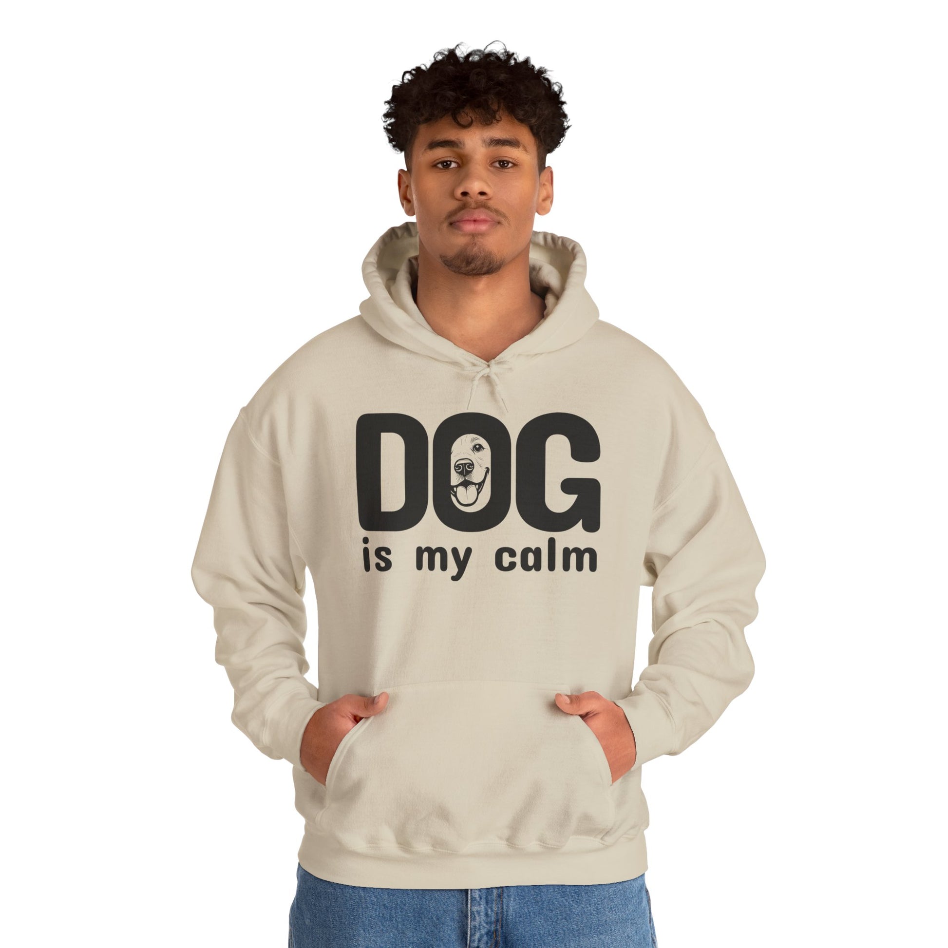 Person wearing a beige hoodie with 'DOG is my calm' text on a white background