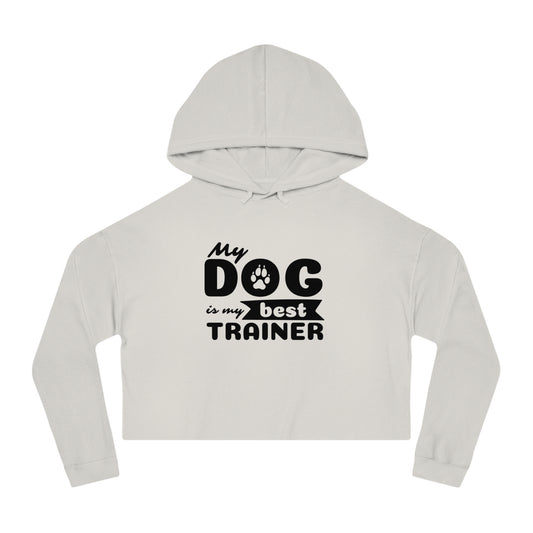 Light gray cropped hoodie with 'My dog is my best trainer' text on a white background