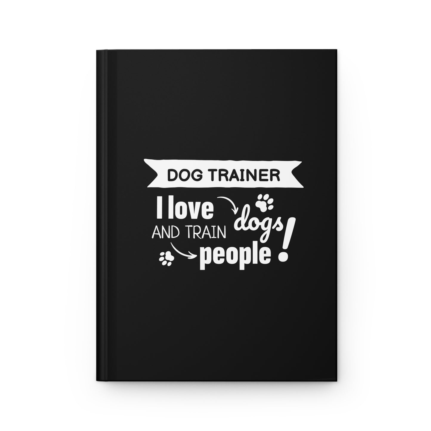 Black notebook with white text 'Dog Trainer I love and train dogs people!' on a white background